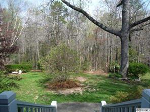 2628 Farmlake Lane Fort Mill, SC 29708 - Photo 16 of 16 a backyard of a house with lots of green space
