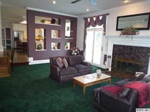 2628 Farmlake Lane Fort Mill, SC 29708 - Photo 8 of 16 a living room with furniture fireplace and flat screen tv