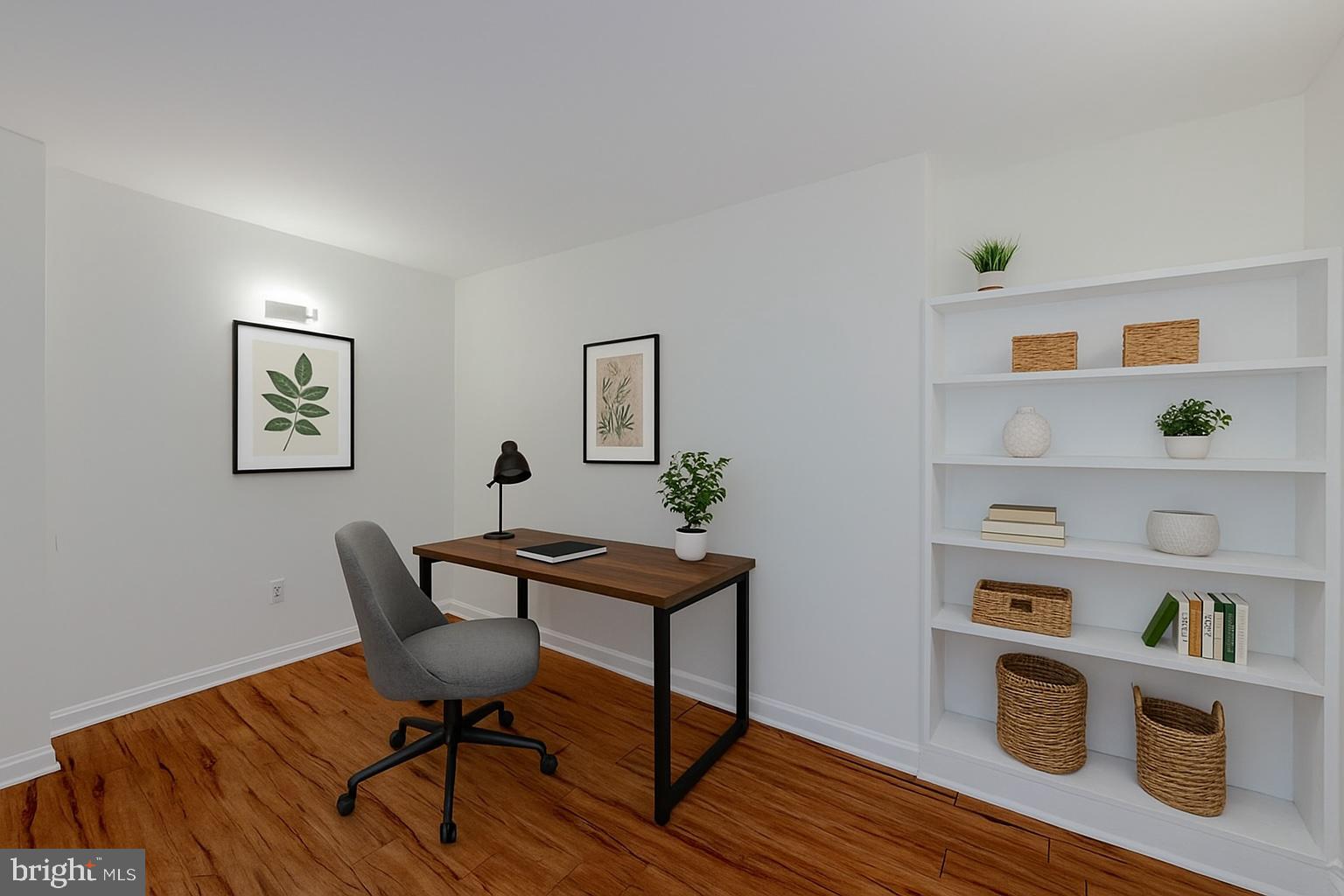4410 Oglethorpe Street, Unit 713 Hyattsville, MD 20781 - Photo 9 of 24 a workspace with furniture and wooden floor