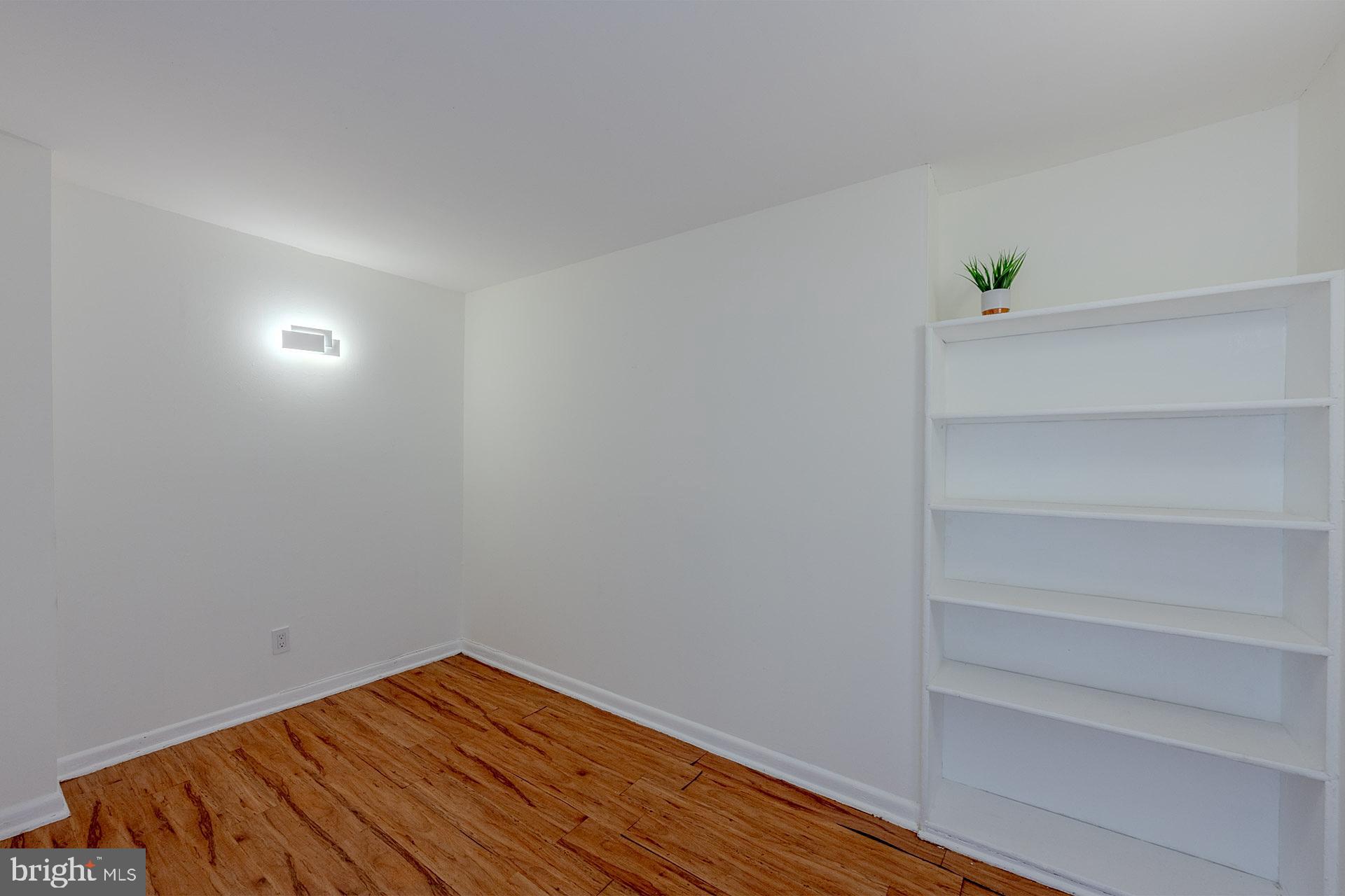 4410 Oglethorpe Street, Unit 713 Hyattsville, MD 20781 - Photo 10 of 24 a view of small space with wooden floor