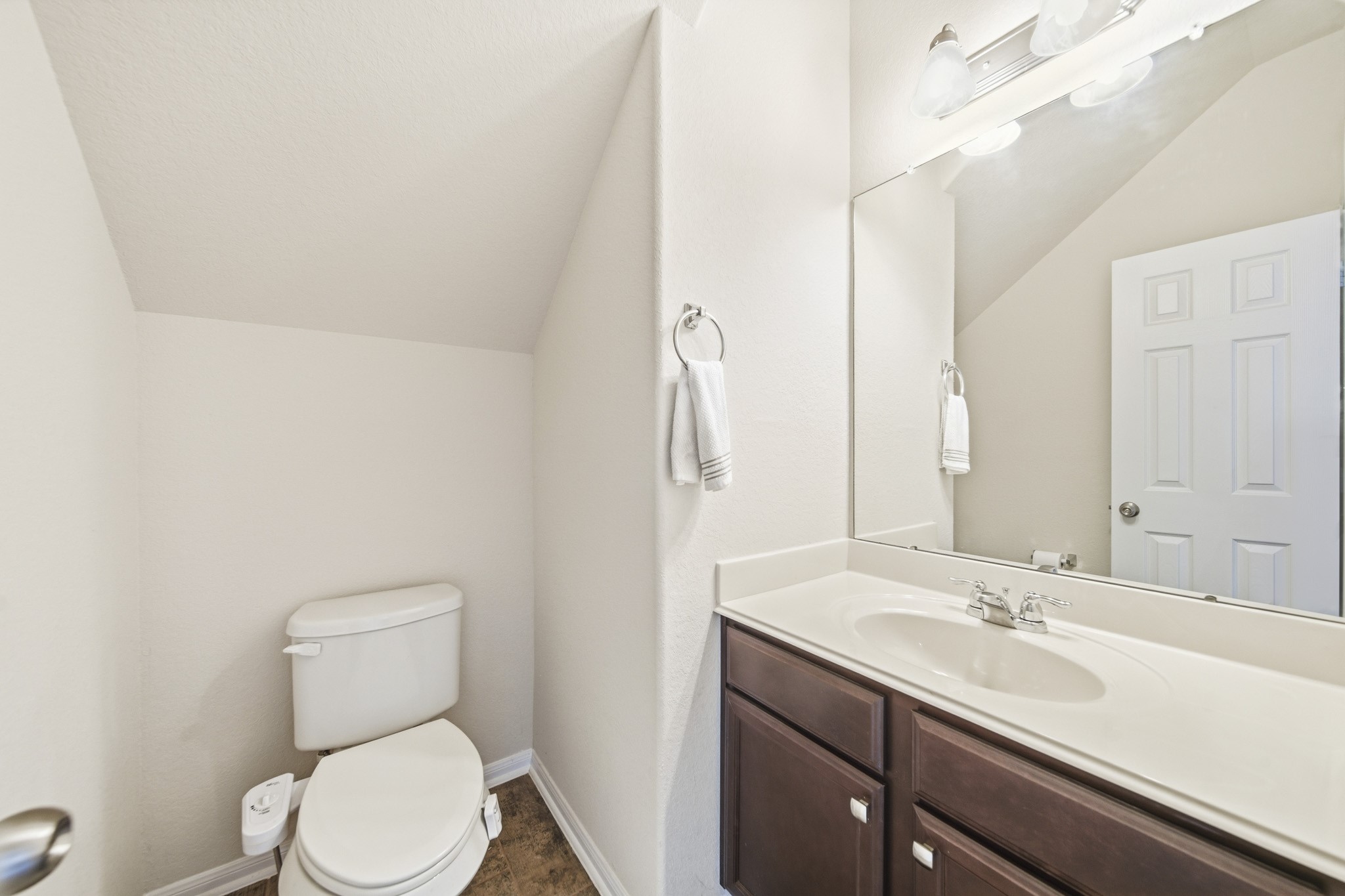 3010 Coachmaker Trail Rosenberg, TX 77471 - Photo 17 of 26 This Lovely half bathroom features a large mirror, light countertops and cabinets.