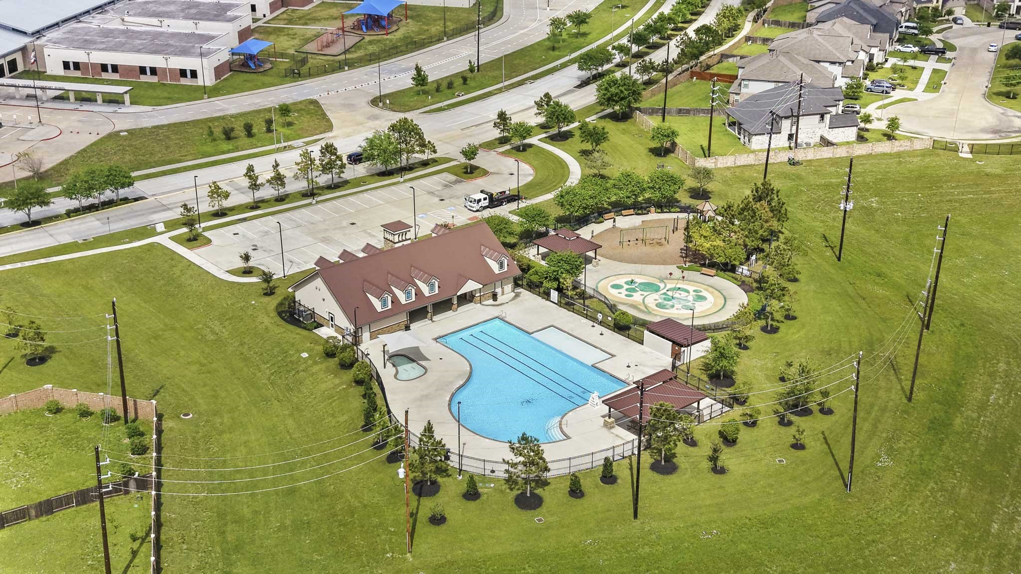 3010 Coachmaker Trail Rosenberg, TX 77471 - Photo 22 of 26 This kind of environment speaks to a community that prioritizes outdoor living, tranquility, and natural beauty. Whether it’s a quiet morning walk, time spent with family, or simply unwinding after a long day, spaces like this offer residents a refreshing escape right outside their door.