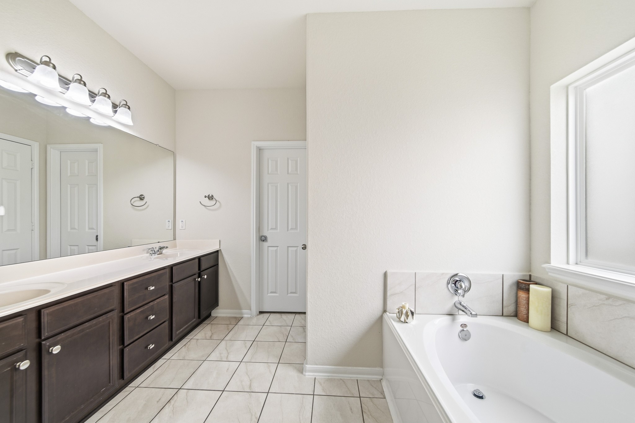 3010 Coachmaker Trail Rosenberg, TX 77471 - Photo 9 of 26 The bathroom offers a spacious, well-designed layout with durable tile flooring and a functional setup.