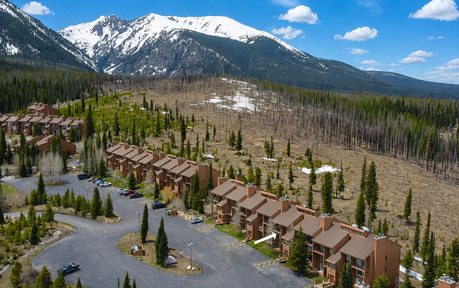 91200 Ryan Gulch Road, Unit 213 Silverthorne, CO 80498 - Photo 31 of 33 a view of a house with a yard