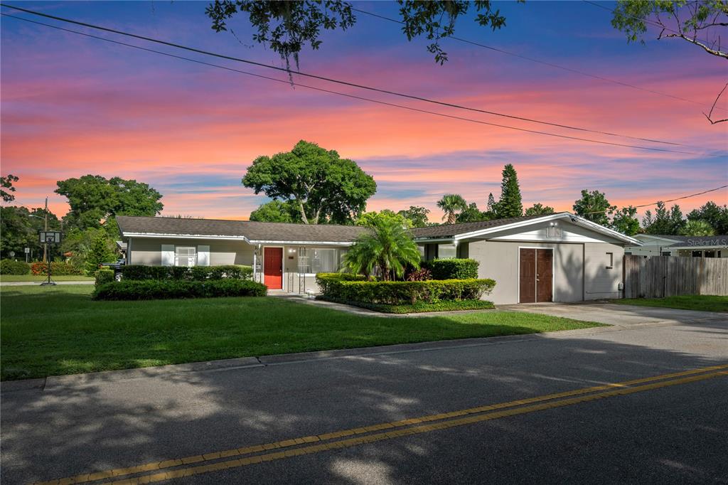 601 Oranole Road Altamonte Springs, FL 32701 - Photo 1 of 36 a front view of a house with a yard and garage