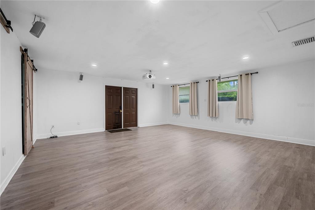 601 Oranole Road Altamonte Springs, FL 32701 - Photo 14 of 36 a view of an empty room with wooden floor and closet