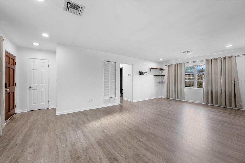 601 Oranole Road Altamonte Springs, FL 32701 - Photo 17 of 36 a view of a livingroom with wooden floor