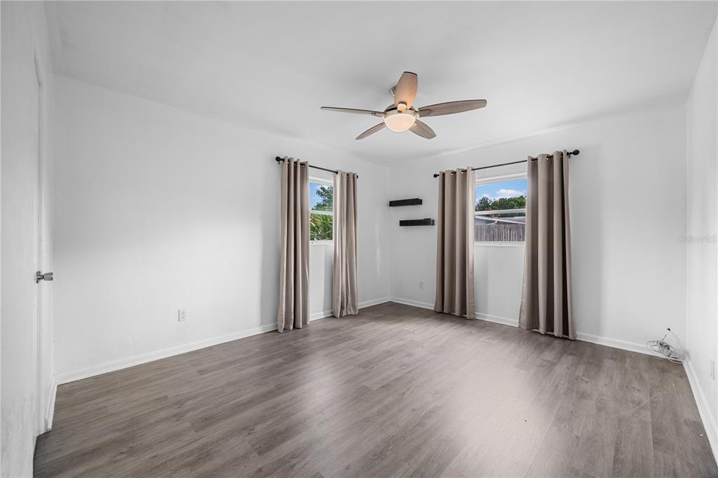 601 Oranole Road Altamonte Springs, FL 32701 - Photo 22 of 36 a view of empty room with wooden floor