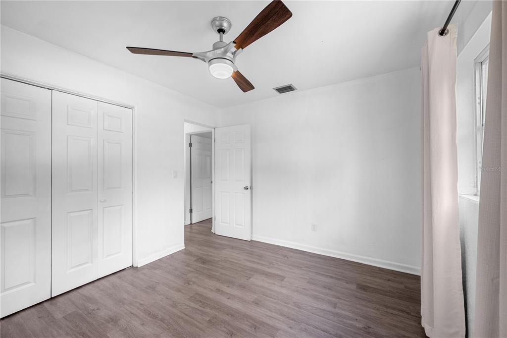 601 Oranole Road Altamonte Springs, FL 32701 - Photo 30 of 36 a view of an empty room with wooden floor