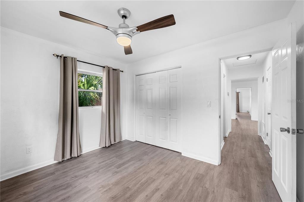 601 Oranole Road Altamonte Springs, FL 32701 - Photo 31 of 36 wooden floor in an empty room with a window