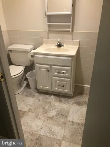 a bathroom with a sink and a toilet