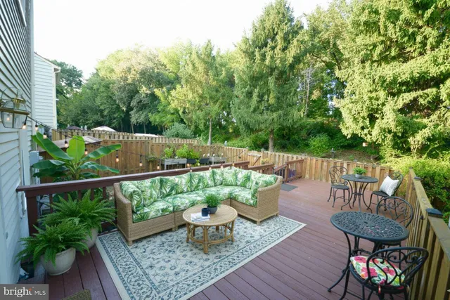 a view of balcony with furniture and outdoor seating