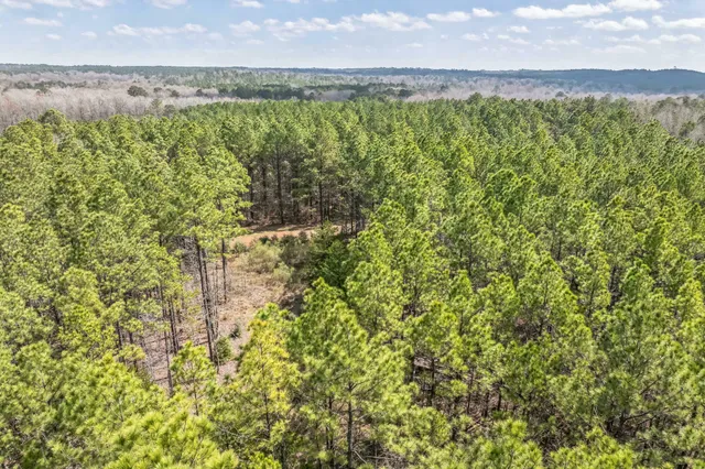 a view of a field with an outdoor space
