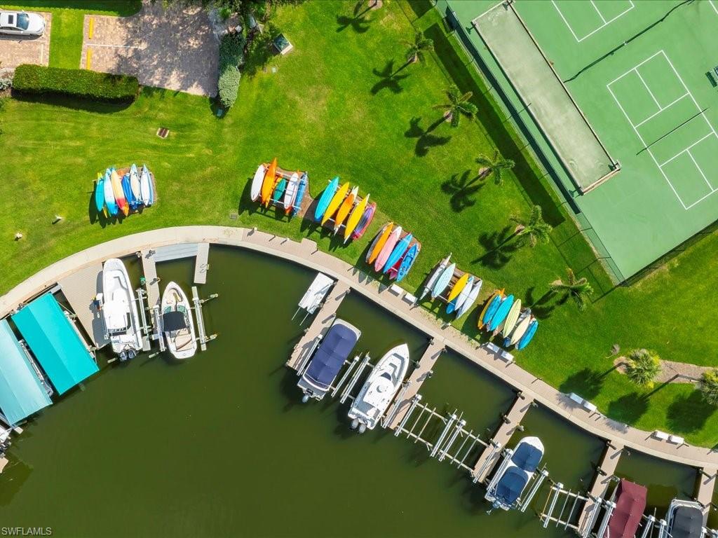 1 Bluebill Avenue, Unit 302 Naples, FL 34108 - Photo 14 of 21 a view of an outdoor space