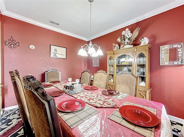 a living room with furniture a rug and a window