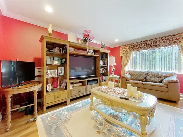 a bathroom with a sink a large mirror and a shower