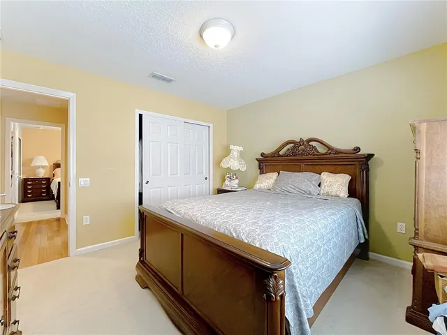 a bathroom with a double vanity sink a mirror and a shower