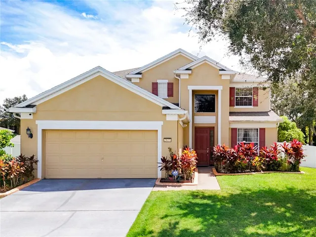 a view of entryway with a table and a chair