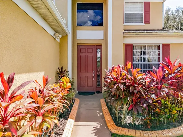 a large kitchen with stainless steel appliances granite countertop a stove sink and cabinets