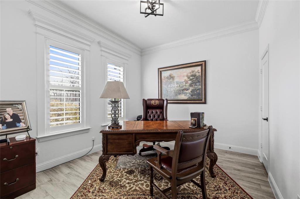 203 Colonial Drive Mabank, TX 75156 - Photo 23 of 36 a view of a workspace with furniture and a window