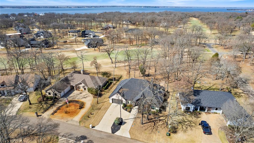 203 Colonial Drive Mabank, TX 75156 - Photo 35 of 36 an aerial view of residential house with parking