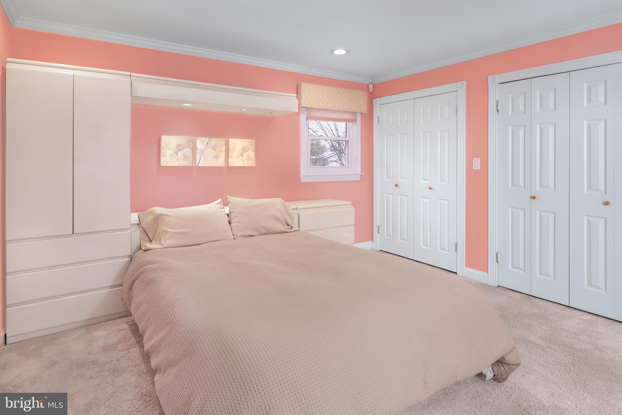 59 Wesleyan Drive Hamilton, NJ 08690 - Photo 18 of 25 a large white bed in a white room