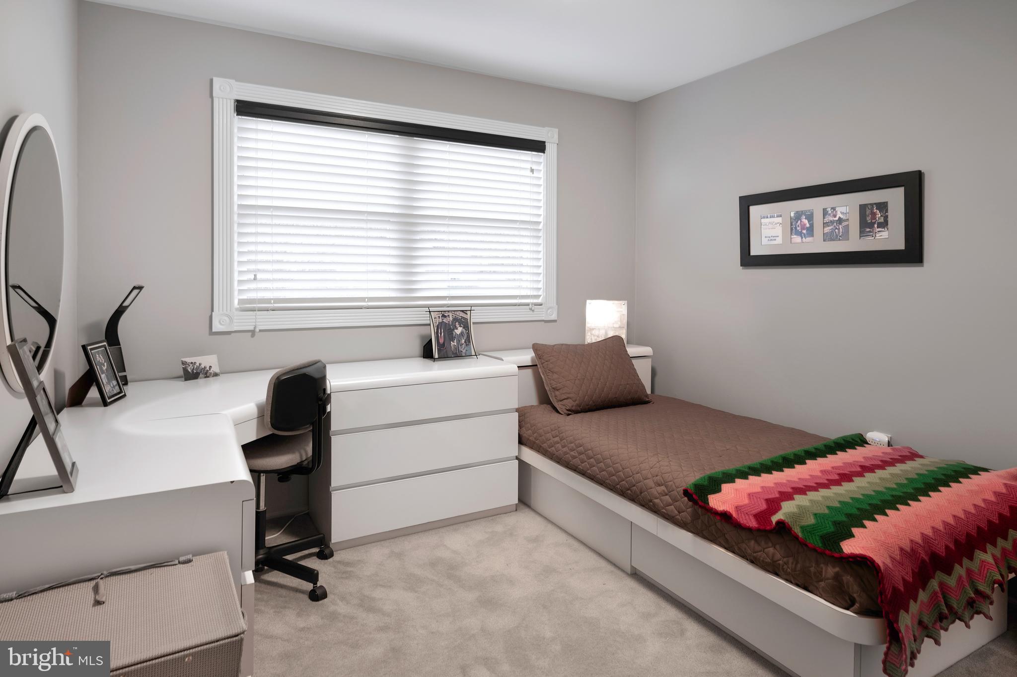 59 Wesleyan Drive Hamilton, NJ 08690 - Photo 20 of 25 a bedroom with a bed and a window