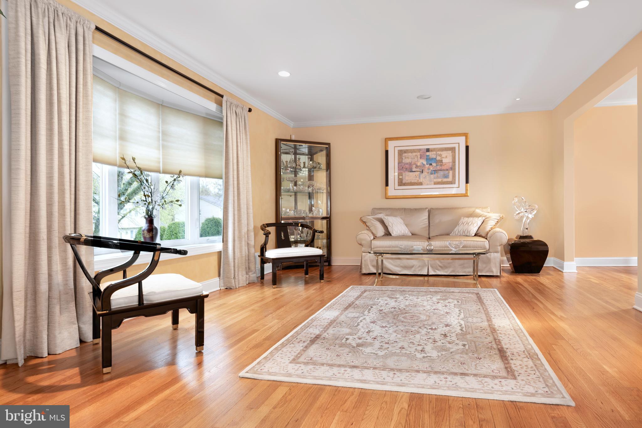 59 Wesleyan Drive Hamilton, NJ 08690 - Photo 9 of 25 a living room with furniture and a wooden floor