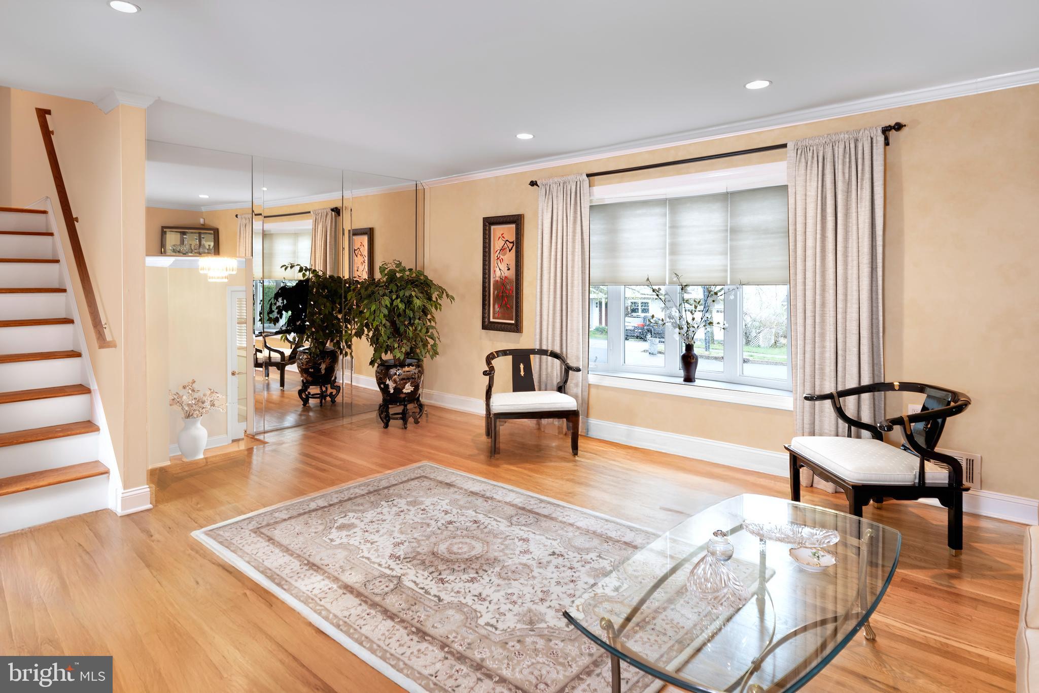 59 Wesleyan Drive Hamilton, NJ 08690 - Photo 10 of 25 a living room with furniture and wooden floor