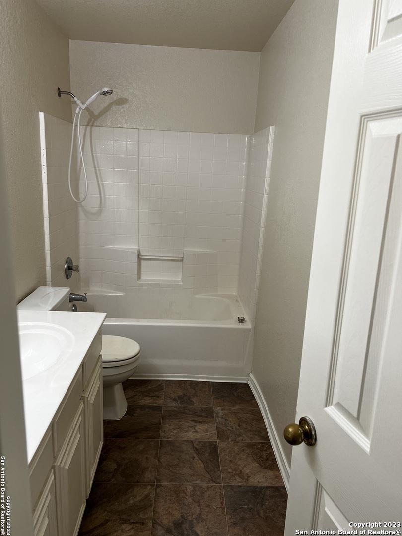 12610 Point Sound San Antonio, TX 78253 - Photo 24 of 39 a bathroom with a sink a toilet and shower