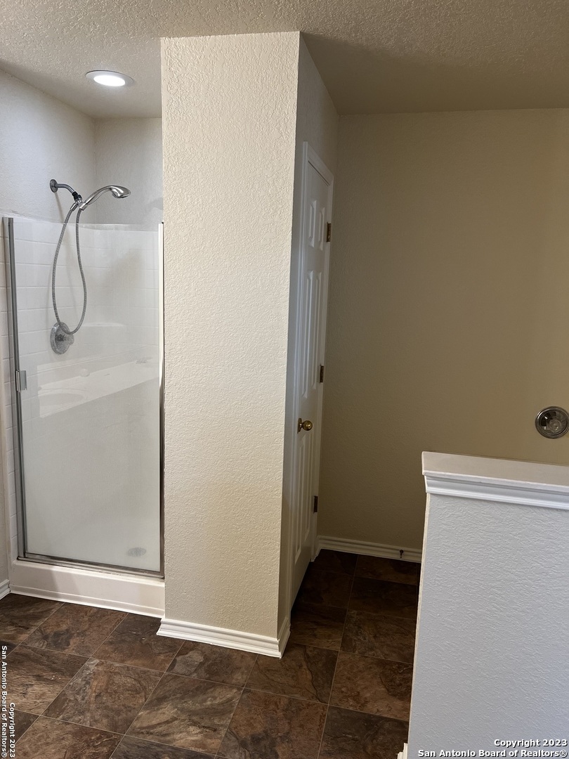 12610 Point Sound San Antonio, TX 78253 - Photo 35 of 39 a bathroom with a shower