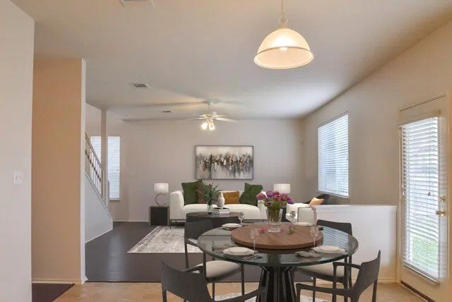 a view of a swimming pool with a patio