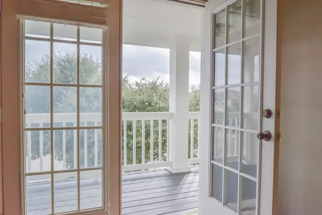 an empty room with windows