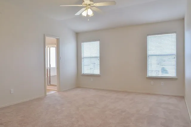a view of a hallway with entryway