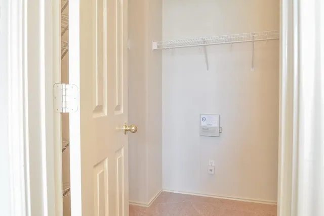 a white bath tub sitting next to a window