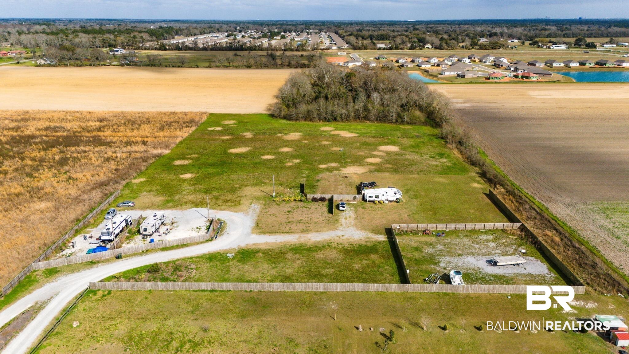 7826 County Road 19 Foley, AL 36535 - Photo 6 of 11 Aerial view of a large body of water
