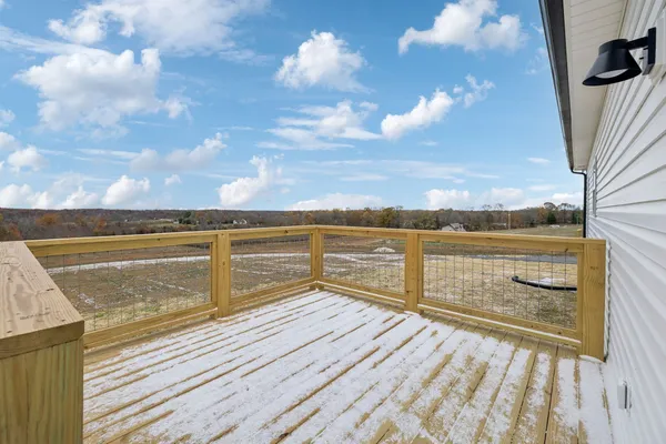 a view of a big room with wooden fence