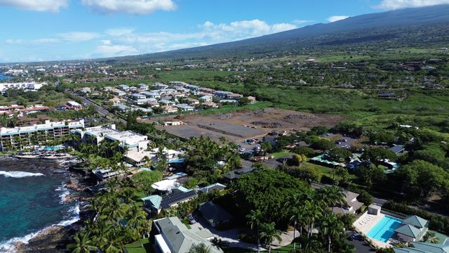 a kitchen with stainless steel appliances a sink stove and refrigerator