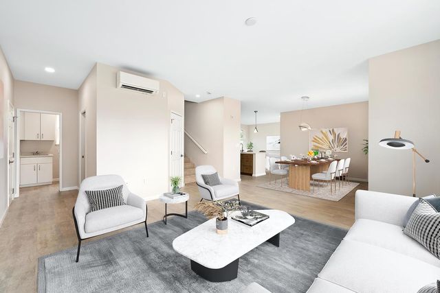 a view of a dining room with furniture