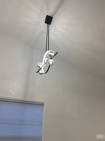 a wall with a vase of flowers on it