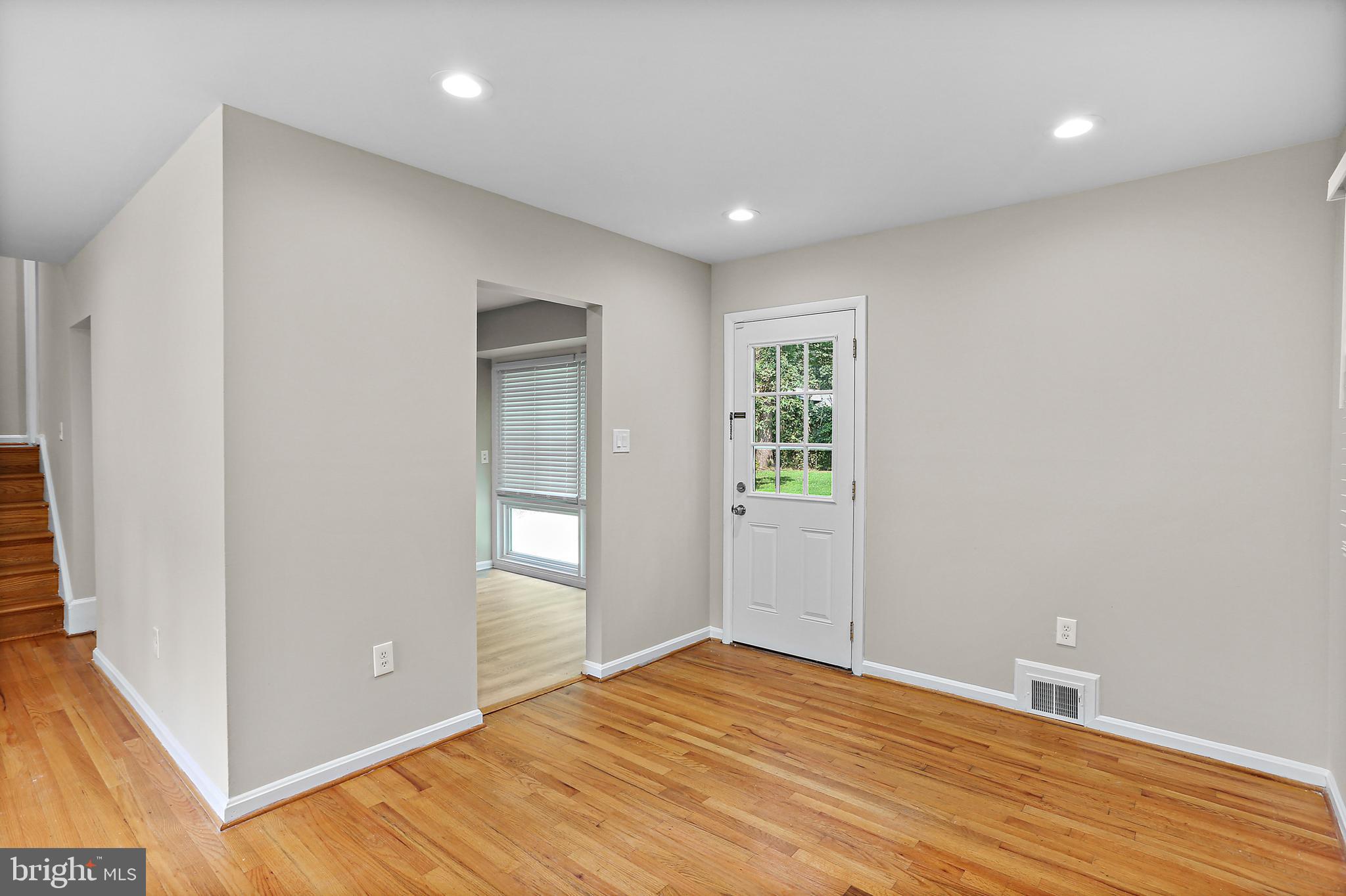 4113 Weller Road Silver Spring, MD 20906 - Photo 8 of 35 wooden floor in an empty room with a window
