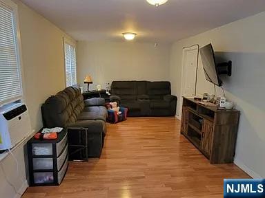 17-19 Limekiln Road Phillipsburg, NJ 08865 - Photo 6 of 12 a living room with furniture and a flat screen tv