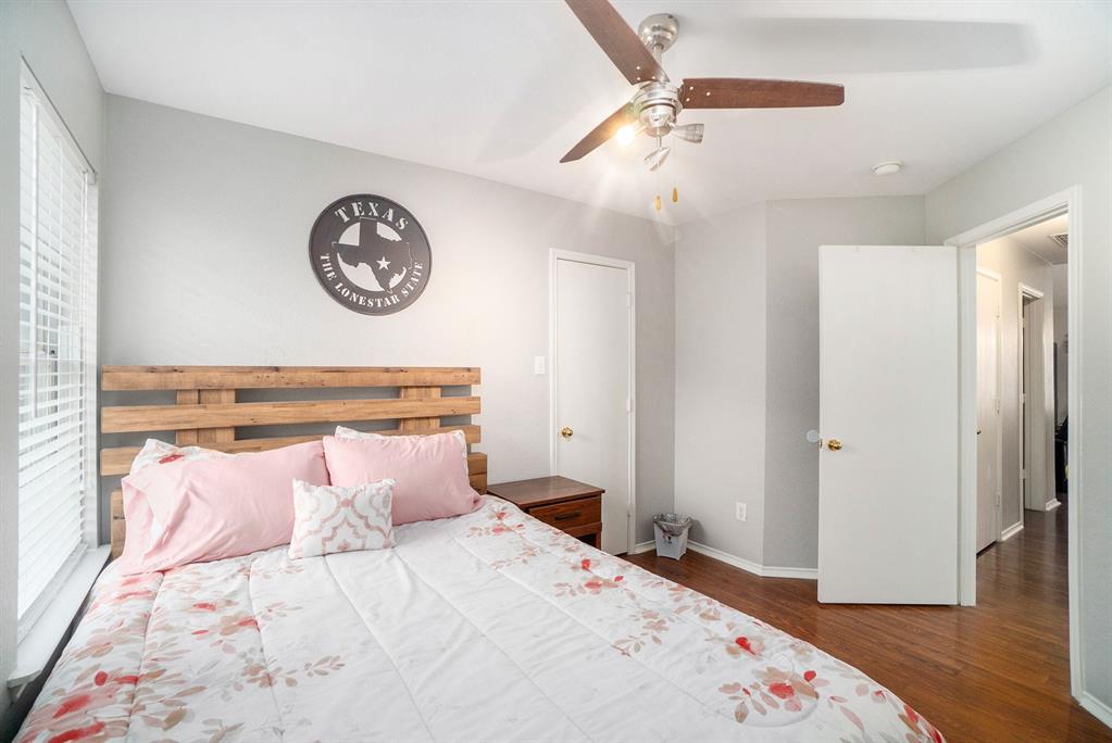 2808 Wakecrest Drive Fort Worth, TX 76108 - Photo 18 of 22 a bedroom with a bed and wooden floor
