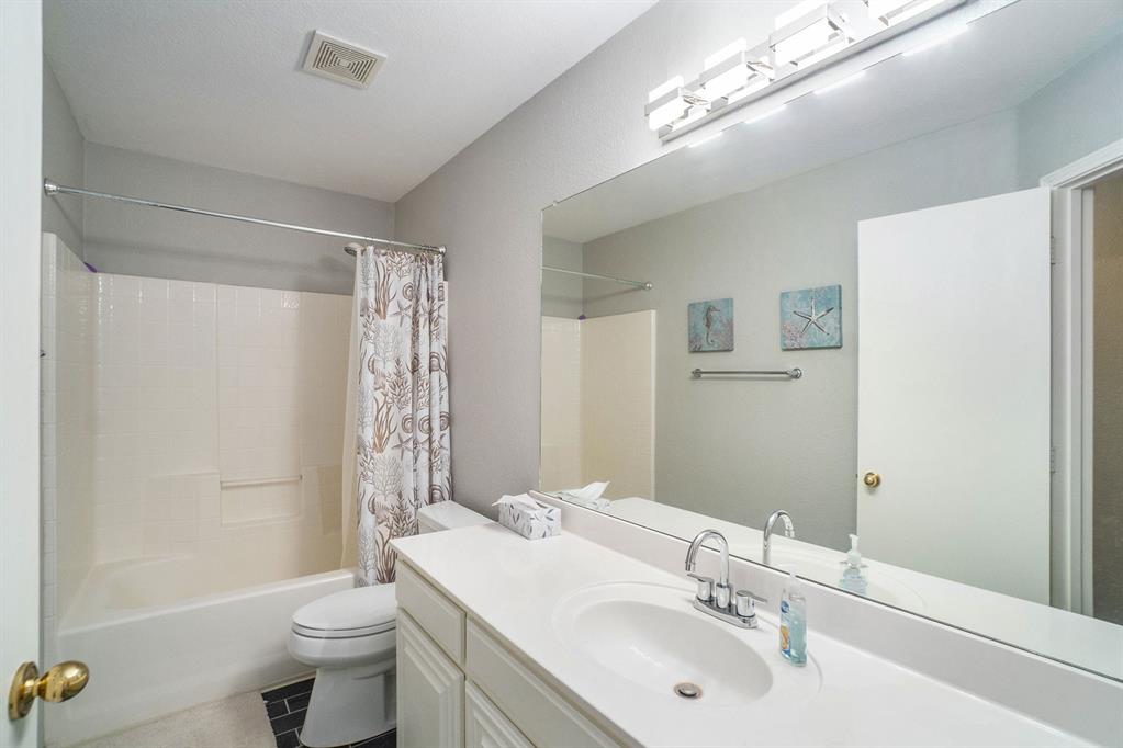 2808 Wakecrest Drive Fort Worth, TX 76108 - Photo 19 of 22 a bathroom with a sink toilet and shower