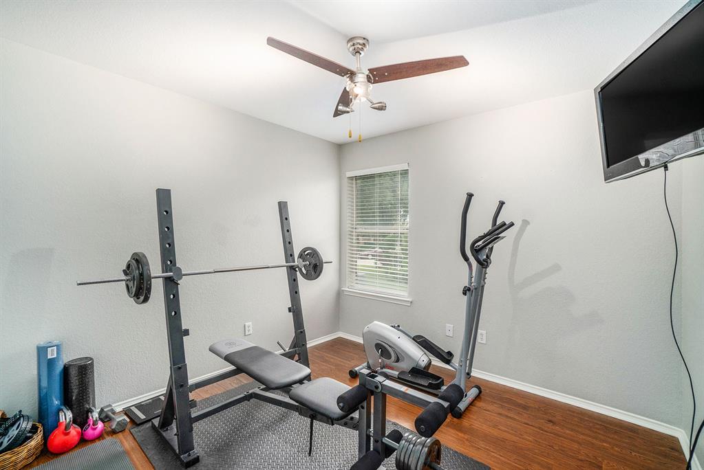 2808 Wakecrest Drive Fort Worth, TX 76108 - Photo 20 of 22 a room with furniture and a flat screen tv