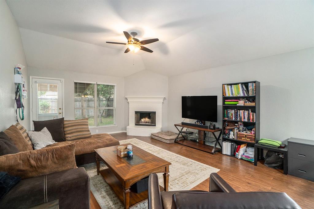 2808 Wakecrest Drive Fort Worth, TX 76108 - Photo 7 of 22 a living room with furniture and a flat screen tv