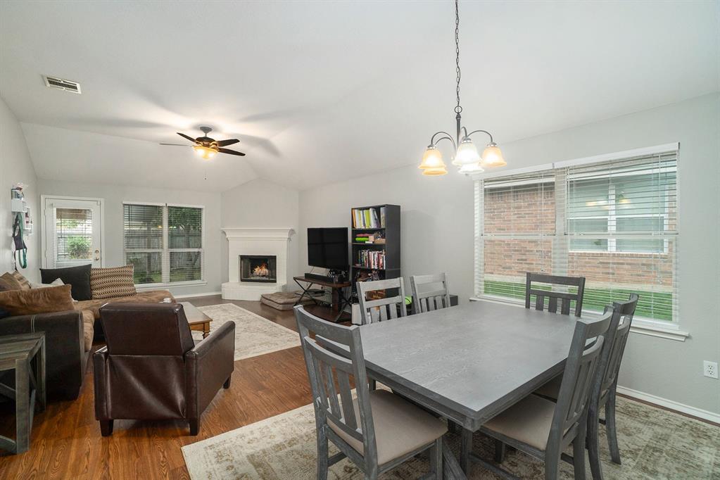 2808 Wakecrest Drive Fort Worth, TX 76108 - Photo 9 of 22 a view of a dining room with furniture window and wooden floor