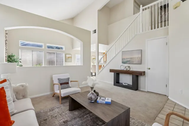 a bathroom with a double vanity sink mirror and bathtub