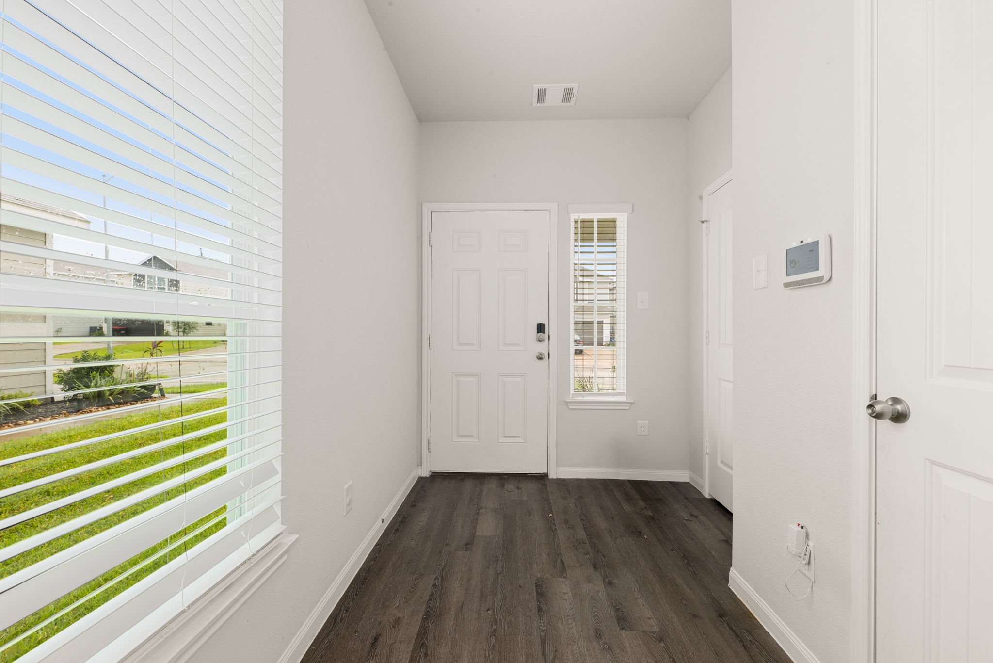 22210 Imperious Parkway Houston, TX 77073 - Photo 8 of 23 a view of a bedroom from a hallway