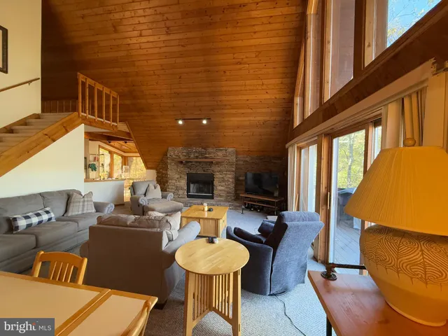 a bedroom with a bed and a mirror